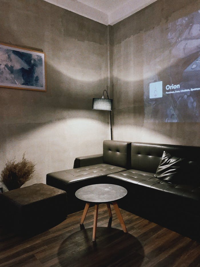 Inviting living room with modern décor and ambient lighting perfect for relaxation and entertainment.